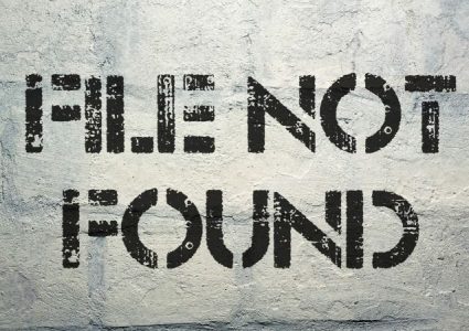 A brick wall with a graffiti that reads 'file not found'.