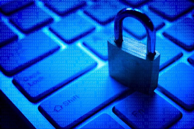 A padlock on a keyboard.