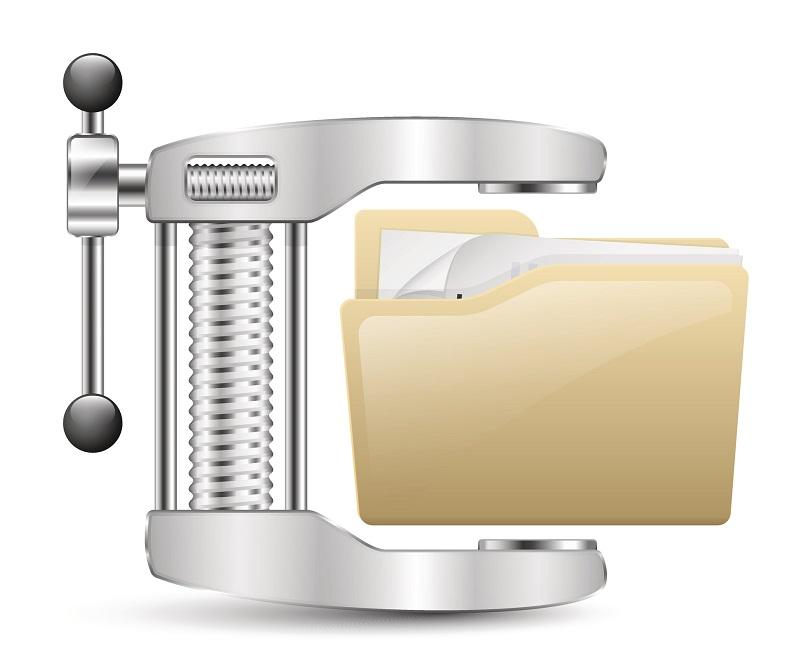 A vice compressing a file.