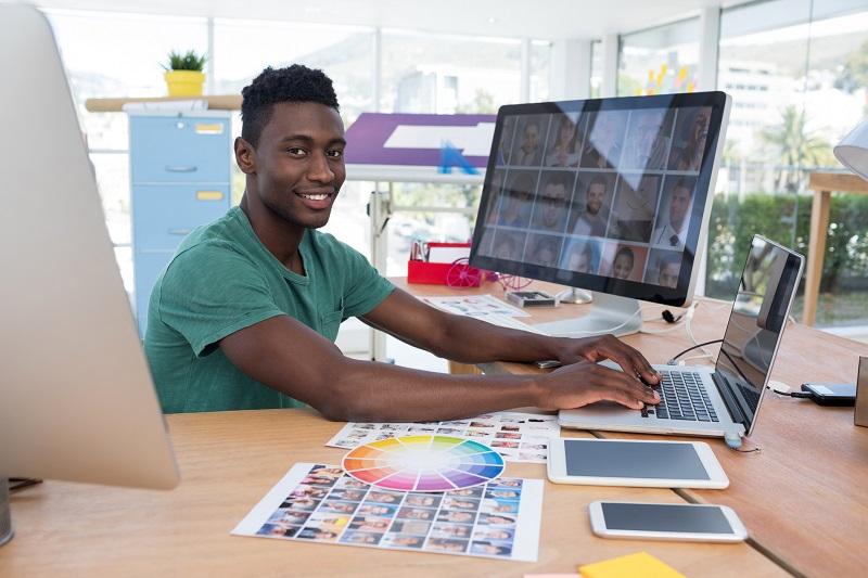 A young man working on a design project.