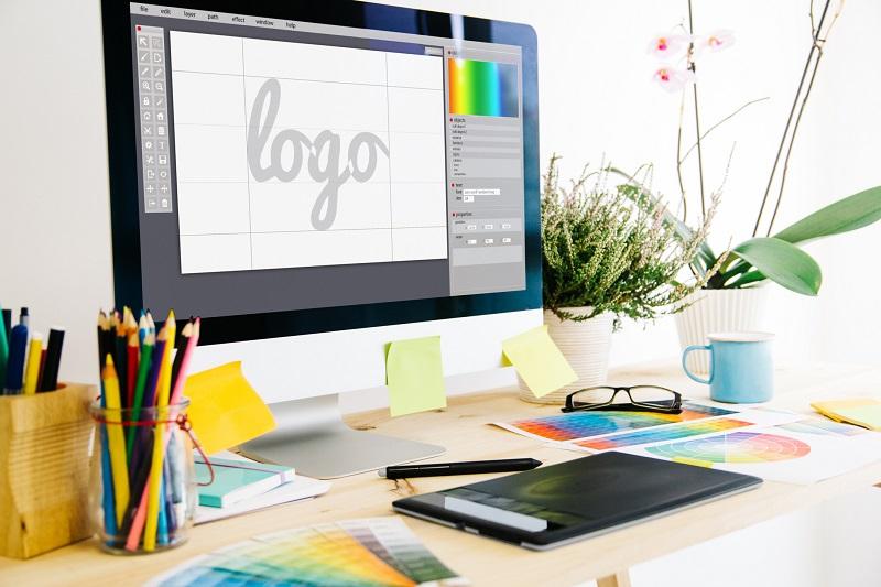 A picture of a logo being created on a computer screen.