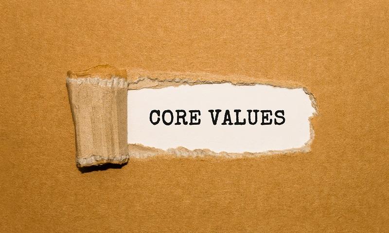 A cardboard box that has 'core values' written on it.