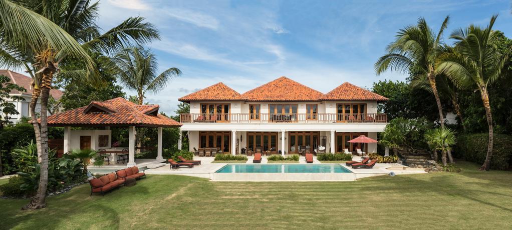 Photo of a luxurious tropical hotel resort.