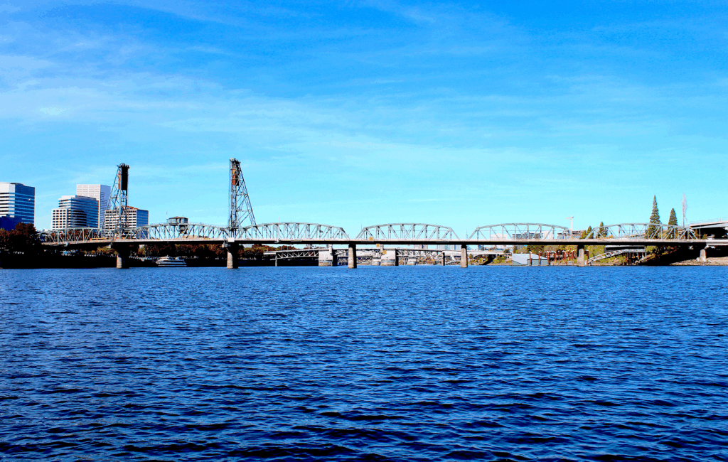 North-facing view of the Hawthorne Bridge crossing the Willamette River.