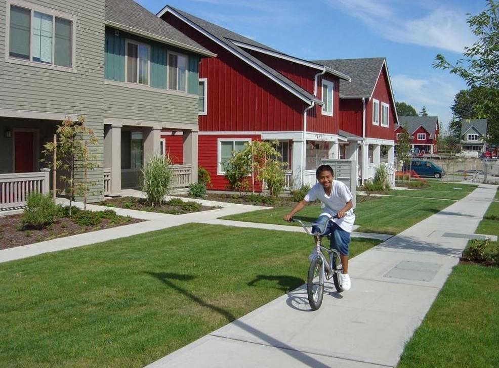 Photo of a boy on a bike.