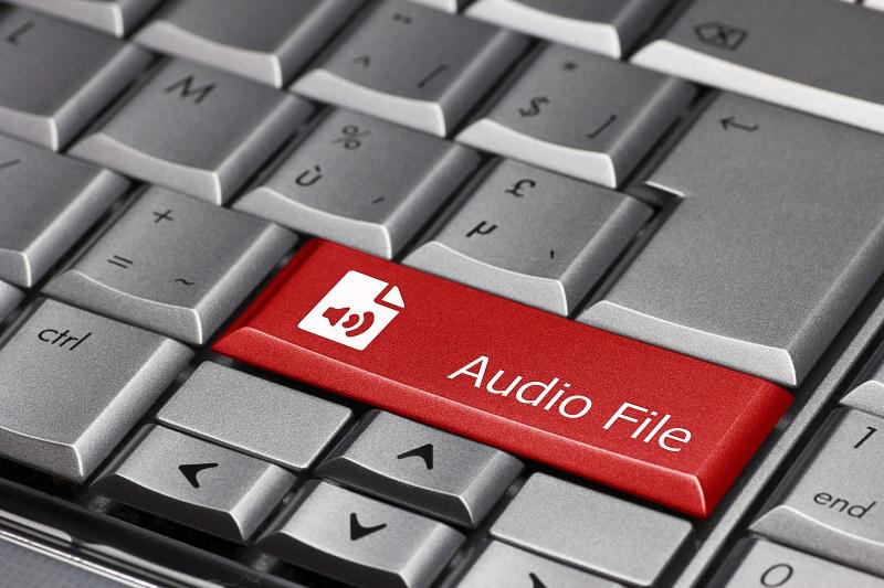 A keyboard that has an 'audio' key.