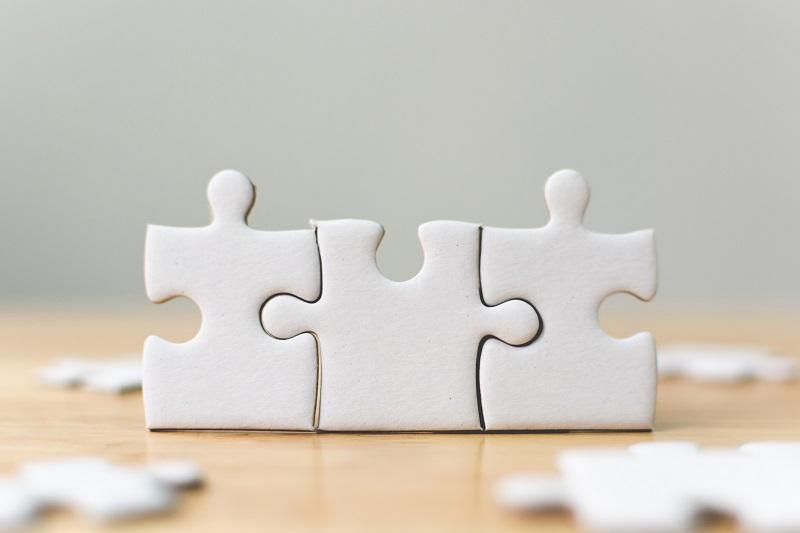Puzzle pieces connected.