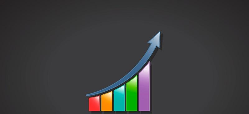 An arrow going up over different color bars.