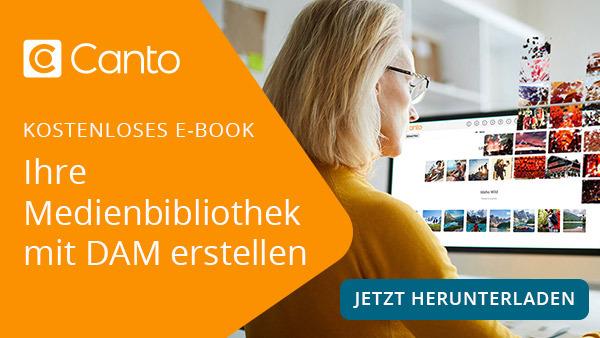 Banner-Link zu einem E-Book, es zeigt eine Frau, die an einem Schreibtisch sitzt und mit dem DAM-System Canto arbeitet.