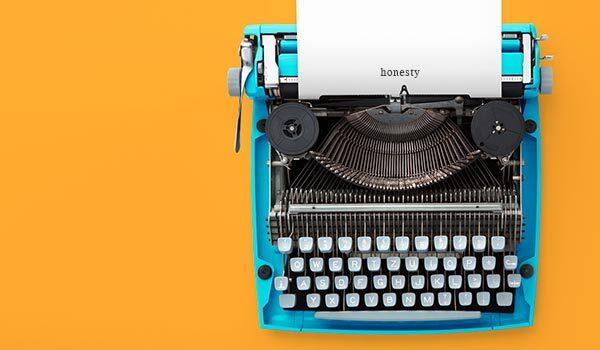 A typewriter that says 'honesty'.