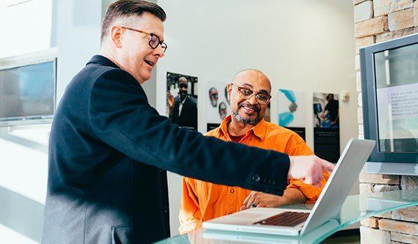 A person talking to a customer.