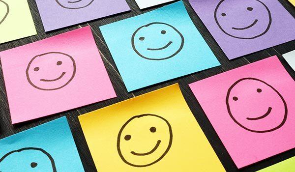 Smiley faces on sticky notes.