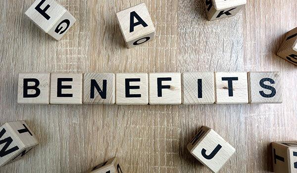 A group of blocks that spell 'benefits'.