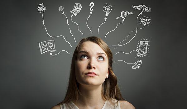 A young woman thinking of different options.
