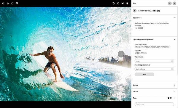 Ein Foto von einem Surfer mit den zugehörigen Informationen zum Digital Rights Management.