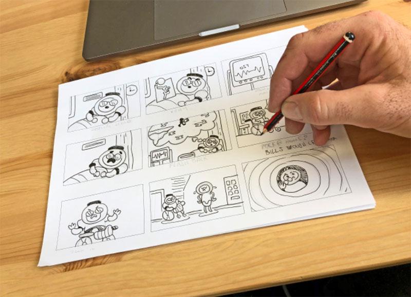 Paper with drawn storyboard for iAM Learning course. 