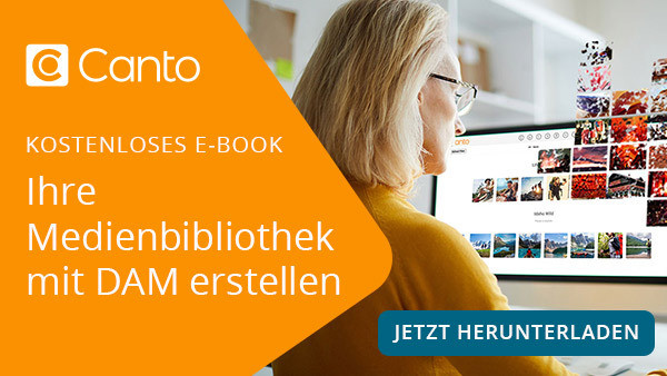 Banner-Link zu einem E-Book, es zeigt eine Frau, die an einem Schreibtisch sitzt und mit dem DAM-System Canto arbeitet.