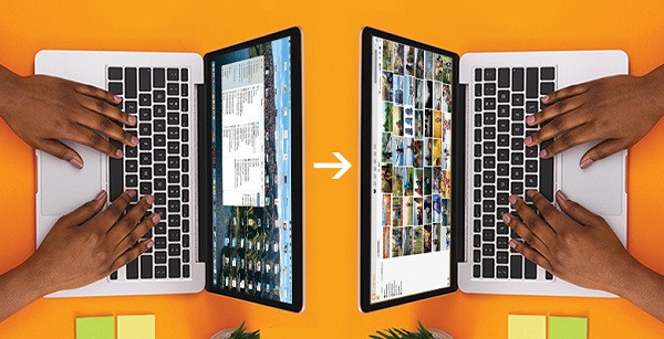 Zwei Laptops, die sich gegenüber stehen und Daten austauschen.