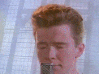 Rick Astley tanzt im Musikvideo zu 'Never Gonna Give You Up'.