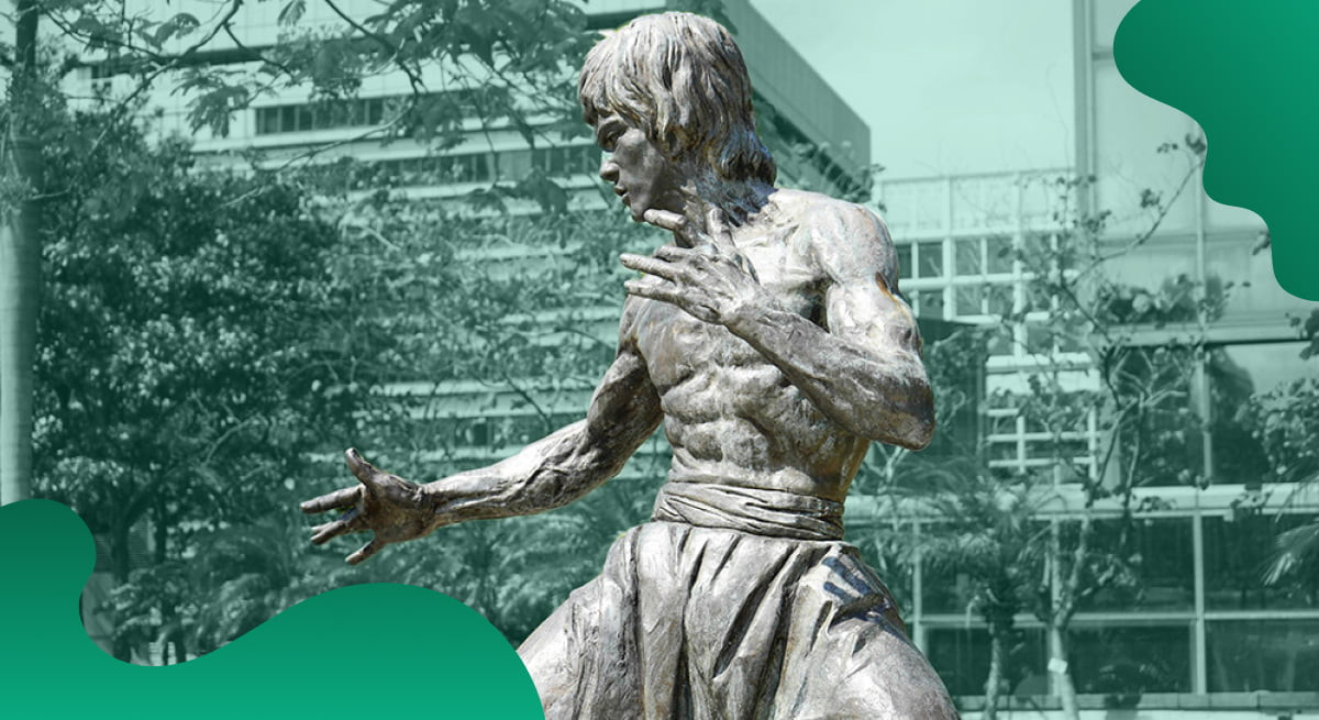 Bruce Lee Enterprises header image in green showing a statue of Bruce Lee in front of a building.