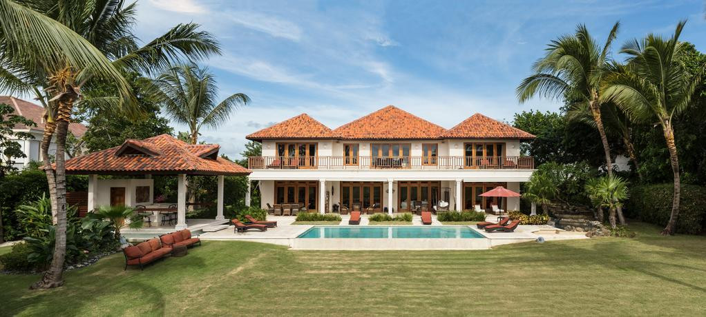 Photo of a luxurious tropical hotel resort.