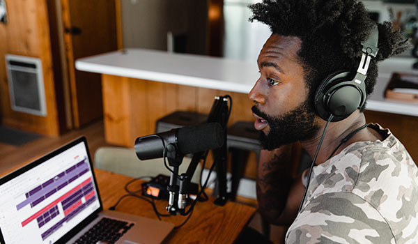A man creating a podcast.