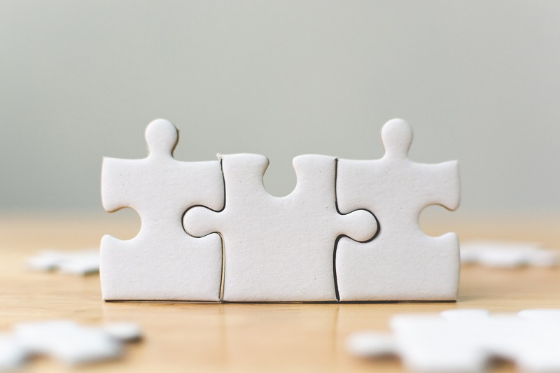 Puzzle pieces connected.