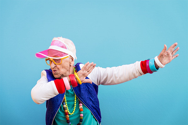 An elderly gentleman dancing.