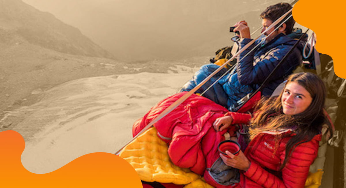 Equip Outdoor Technologies header image in orange showing a group of climbers resting.