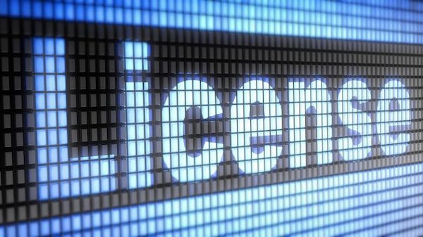 A neon sign of the word license