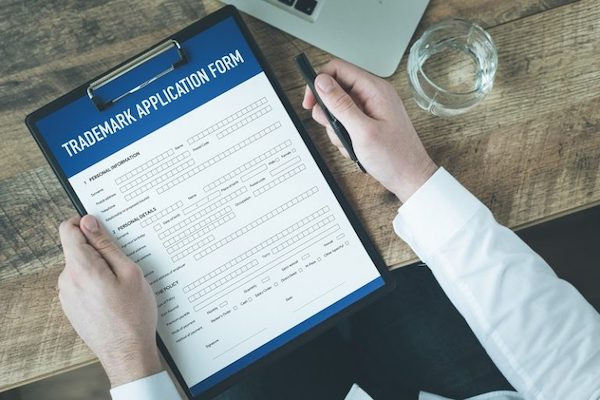 A clipboard and trademark form