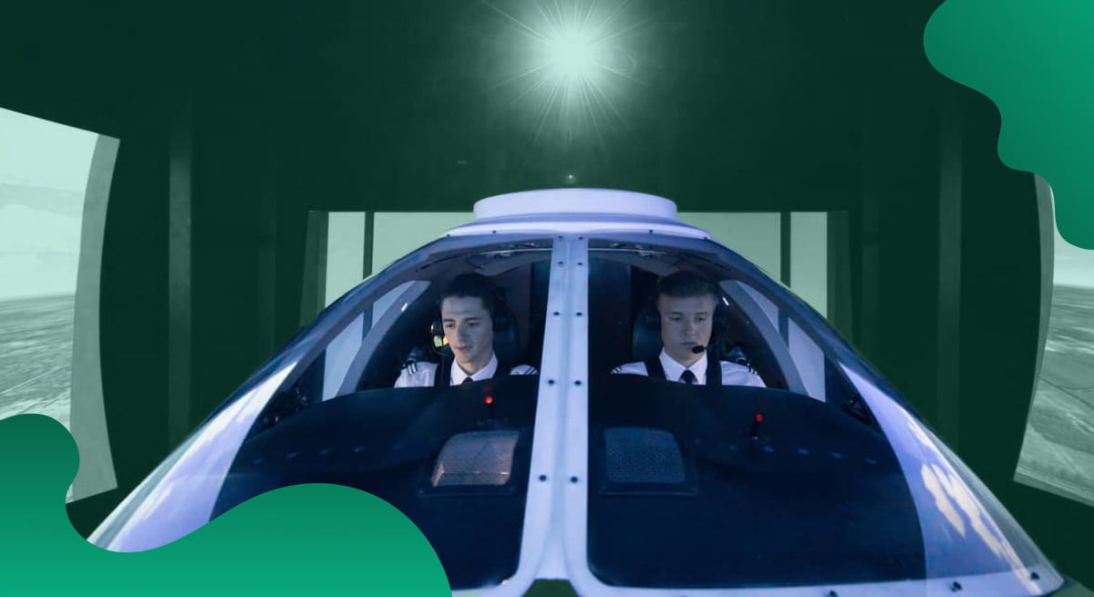 Two pilots are sitting in the simulator at Lufthansa Aviation Training.